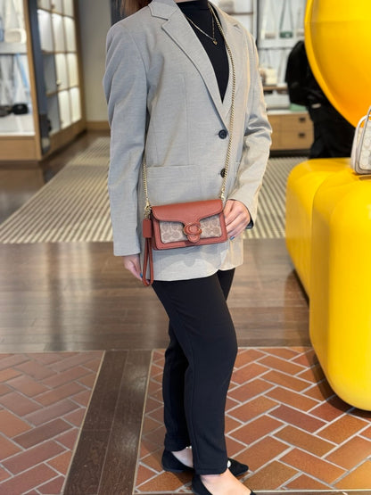 tabby chain clutch in signature canvas