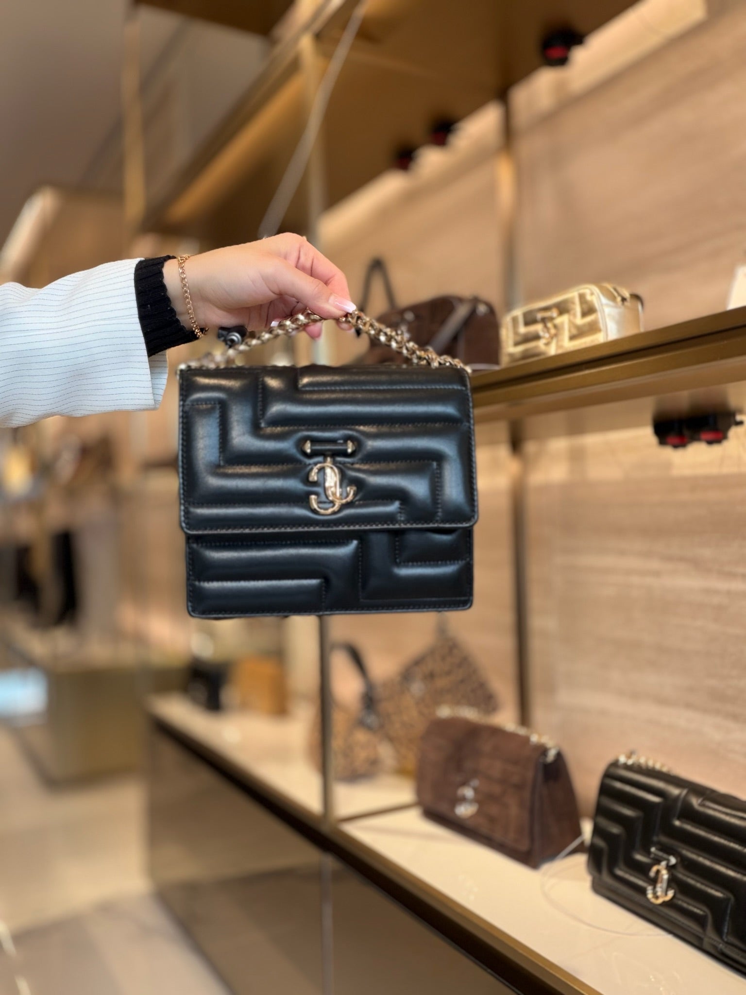 Avenue Quad Quilted Shoulder Bag