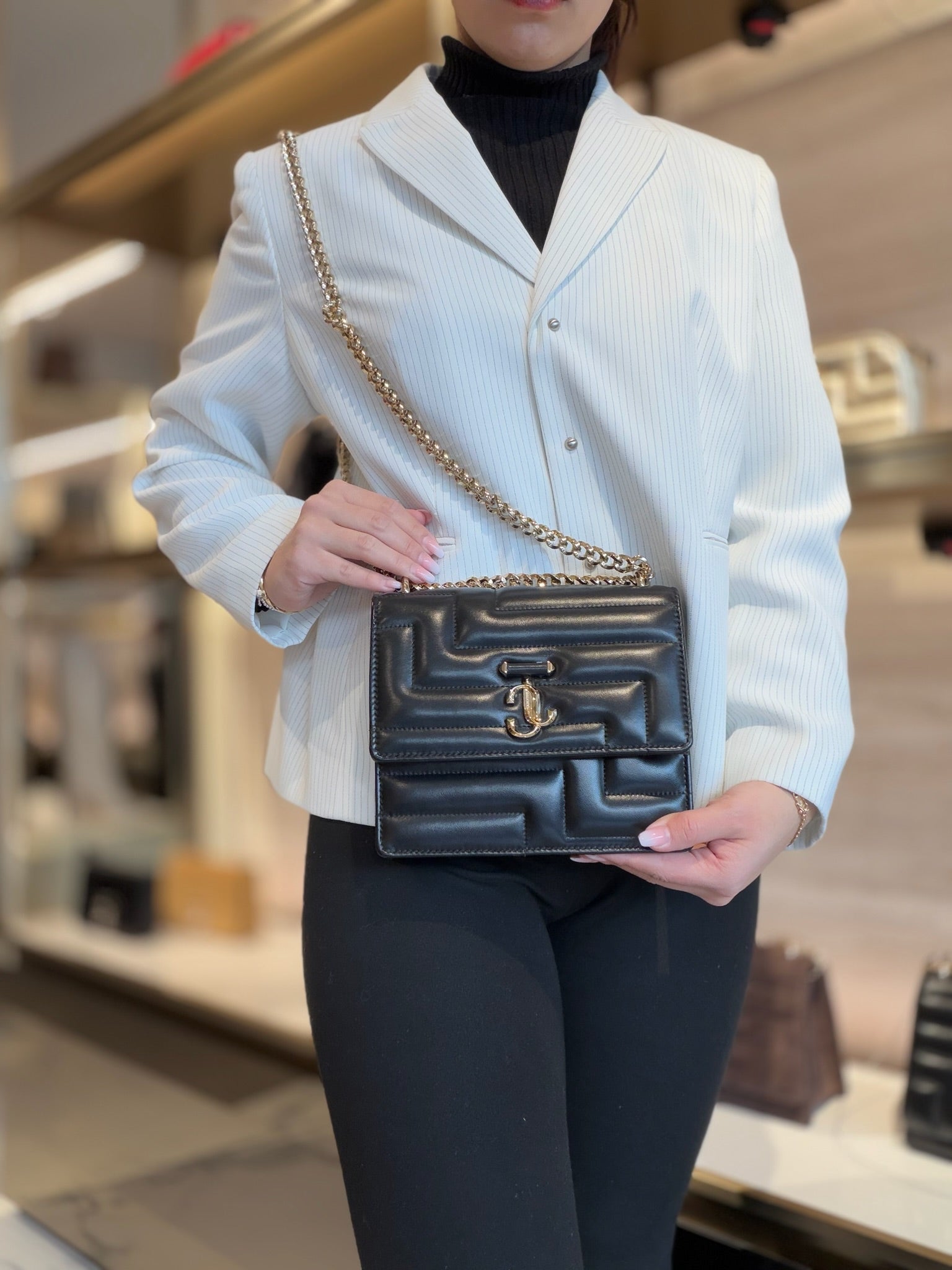 Avenue Quad Quilted Shoulder Bag