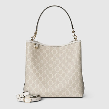 tejido beige y blanca